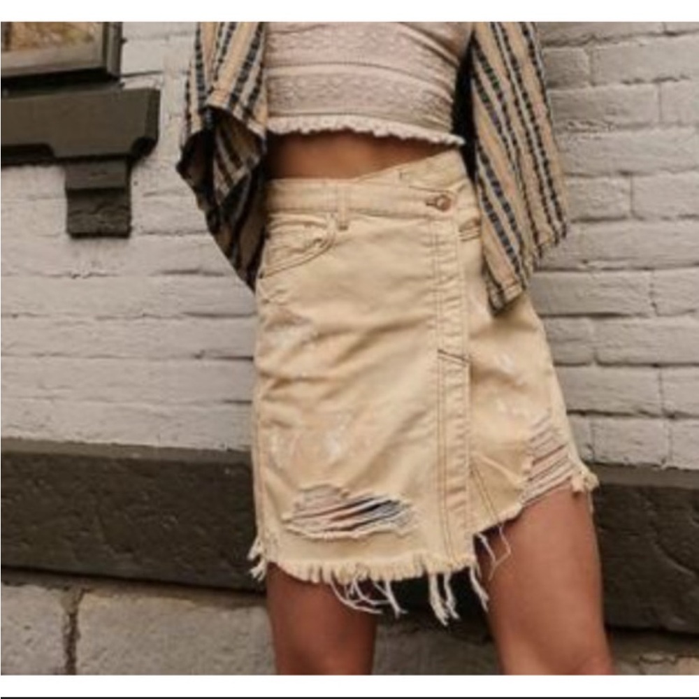 Free People Parker distressed wrap skirt in the color butter cream Size 29